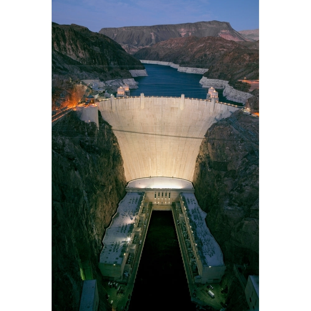 Elevated view at dusk of Hoover Dam and Lake Mead is in the Black Canyon of the Colorado River on Image 1