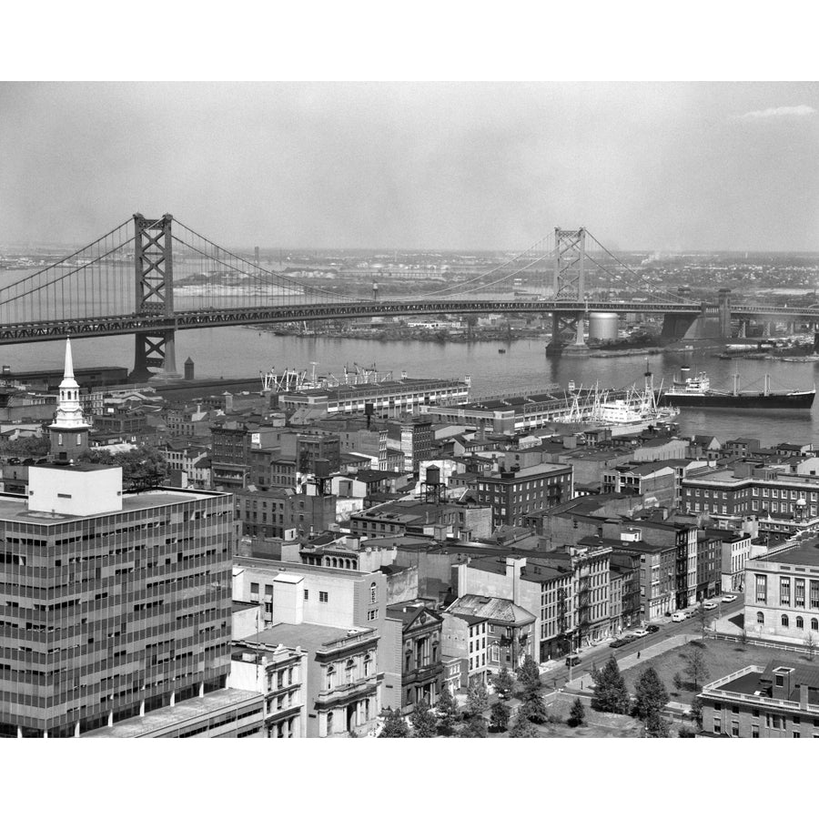 1950s Philadelphia Pa Usa Looking Northeast Past Delaware River Waterfront To Benjamin Franklin Suspension Bridge To Image 1