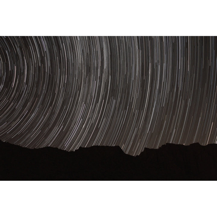 Star trails above a valley in the Firoozkooh area Iran Poster Print Image 1