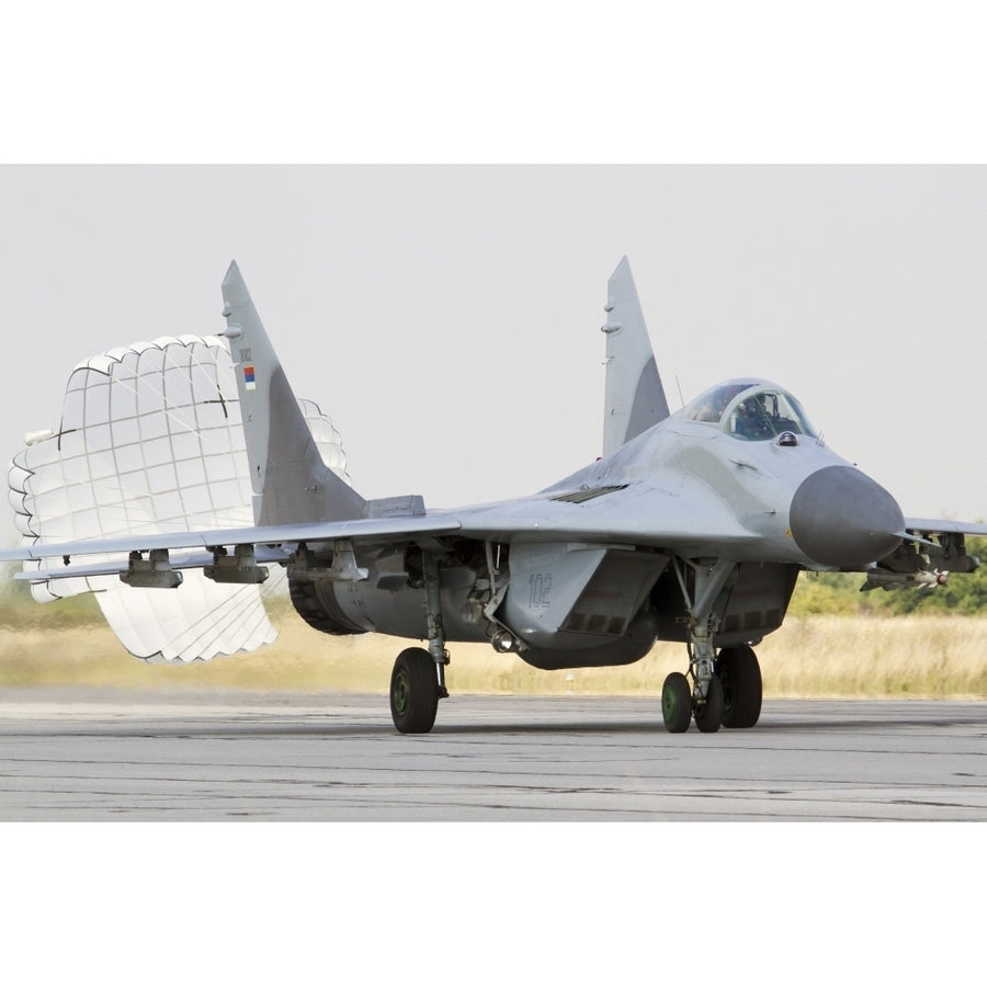 A Serbian Air Force MiG-29 with brake chute deployed Poster Print Image 1