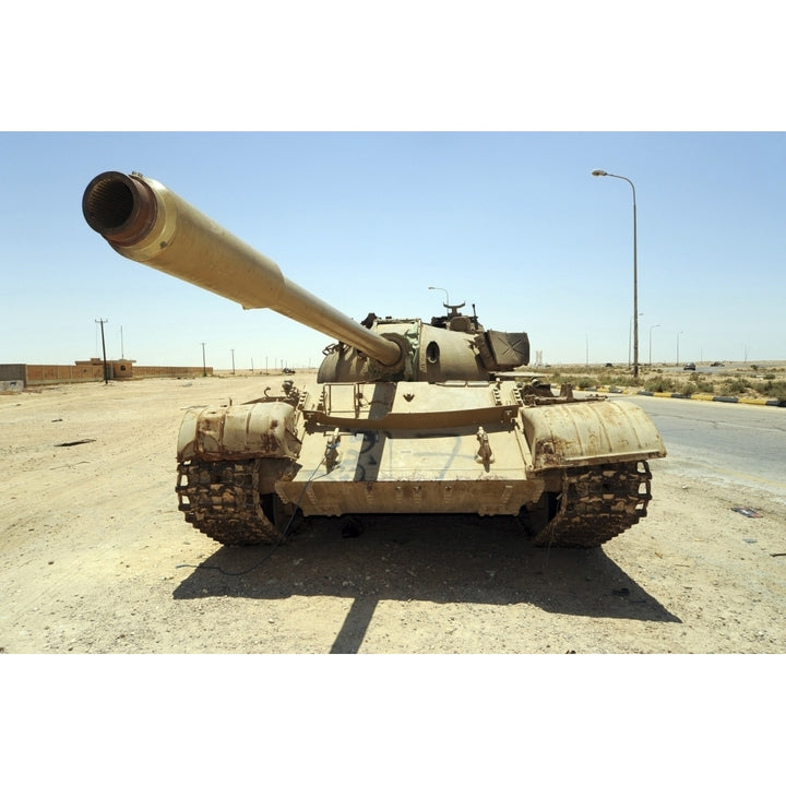 A T-55 tank destroyed by NATO forces in the desert north of Ajadabiya Libya Poster Print Image 1