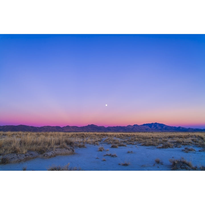 Sunset and gibbous moon above the Chiricahua Mountains in Arizona Poster Print Image 1