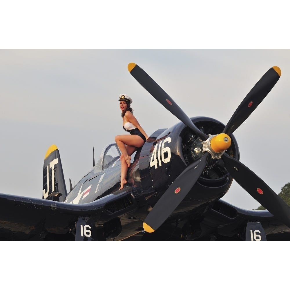 1940s style Navy pin-up girl sitting on a vintage Corsair fighter plane Poster Print Image 2