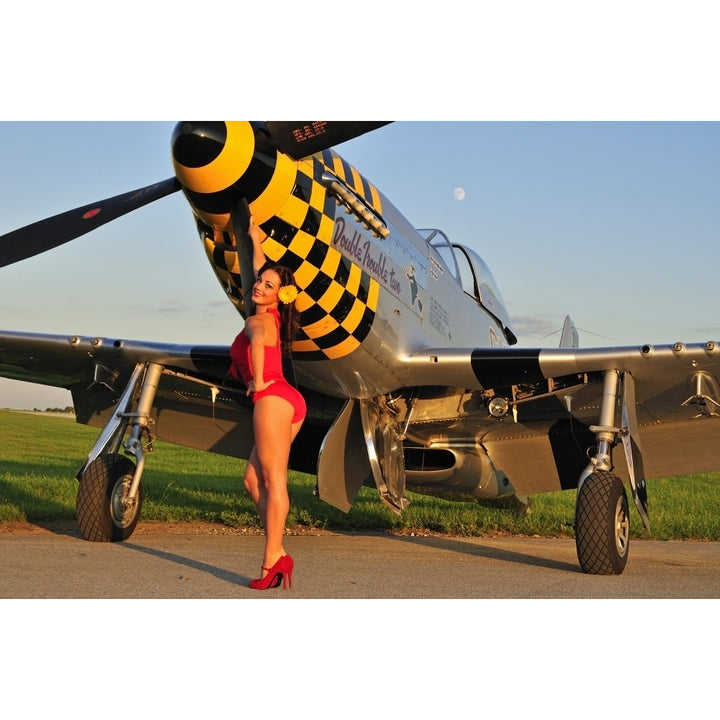 Sexy 1940s style pin-up girl posing with a P-51 Mustang Poster Print Image 1