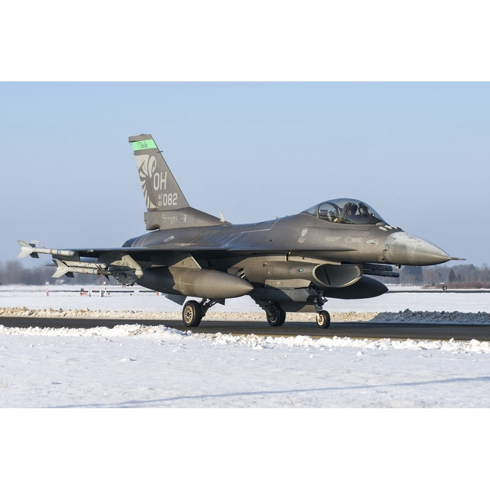 An F-16 from the 180th Fighter Wing taxiing on the runway at Amari Air Base Estonia. Poster Print by Daniele Faccioli/ Image 1