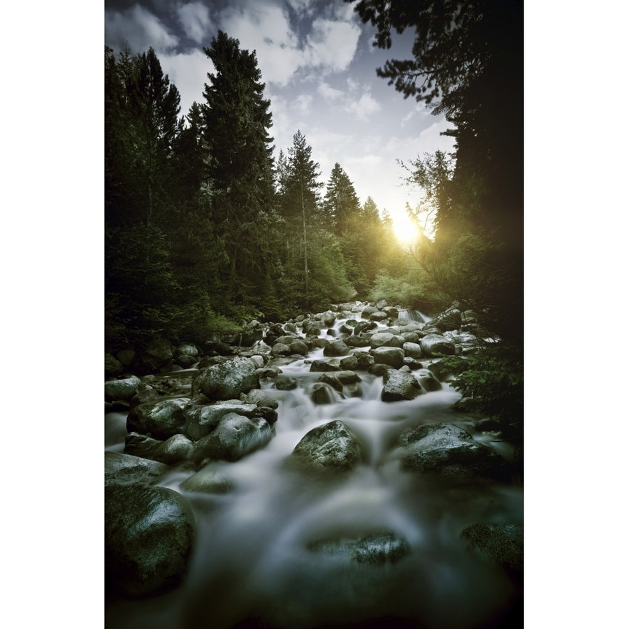 Small river flowing over large stones at sunset Pirin National Park Bulgaria Poster Print Image 1