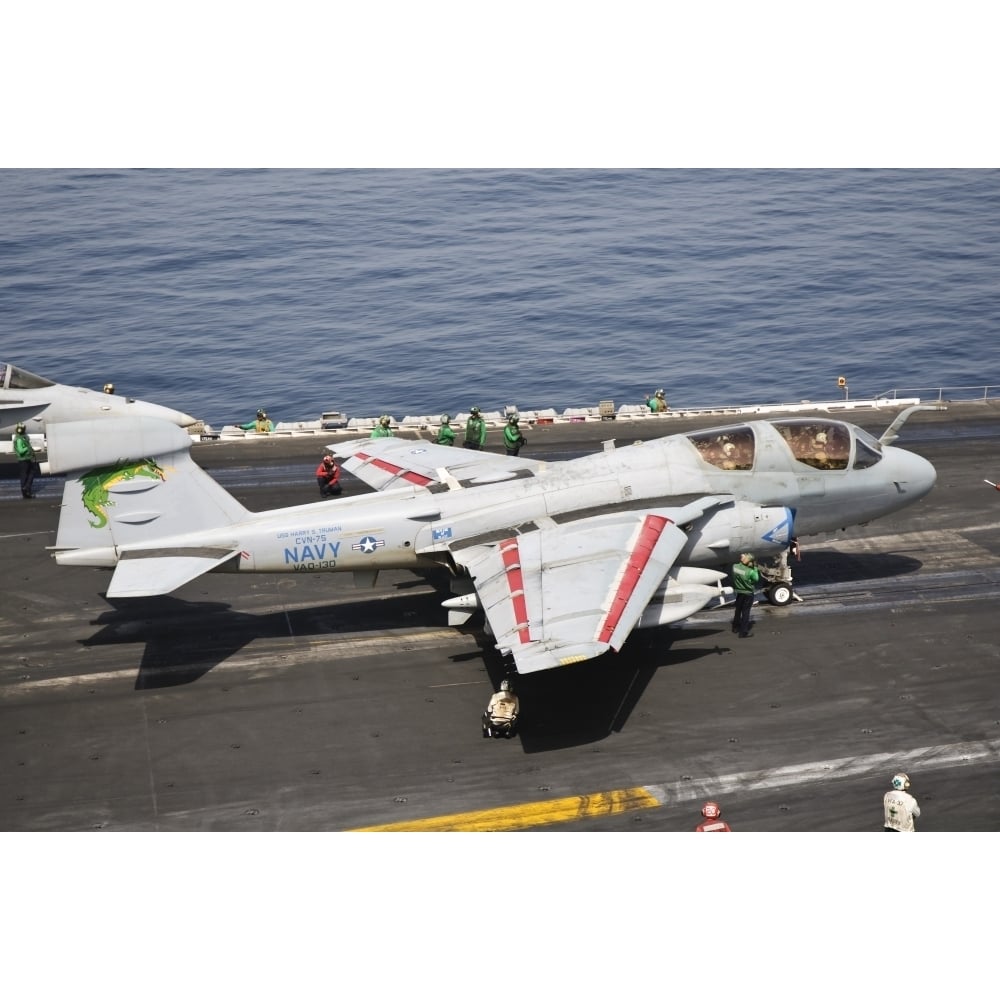 An EA-6B Prowler is ready to go from the flight deck of USS Harry S. Truman Poster Print Image 1