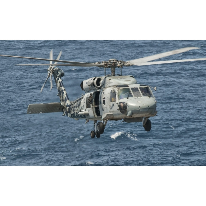 A US Navy SH-60F Seahawk flying off the coast of Pakistan Poster Print Image 2