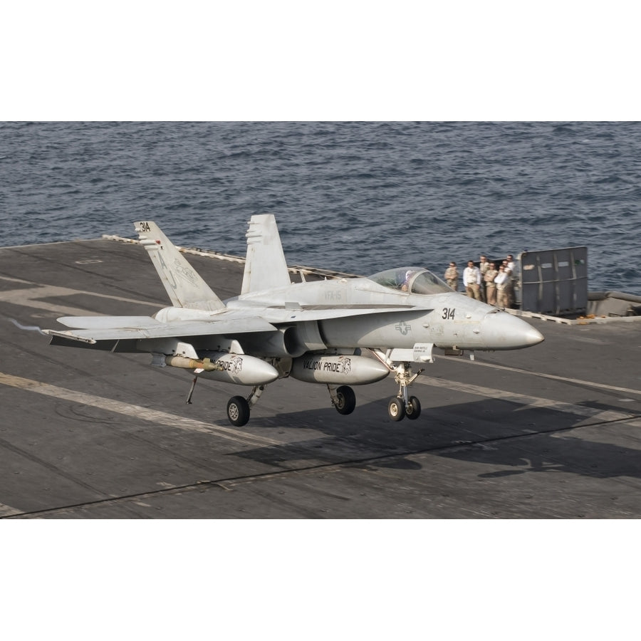 An F/A-18C Hornet trap landing aboard USS George H.W. Bush Poster Print Image 1