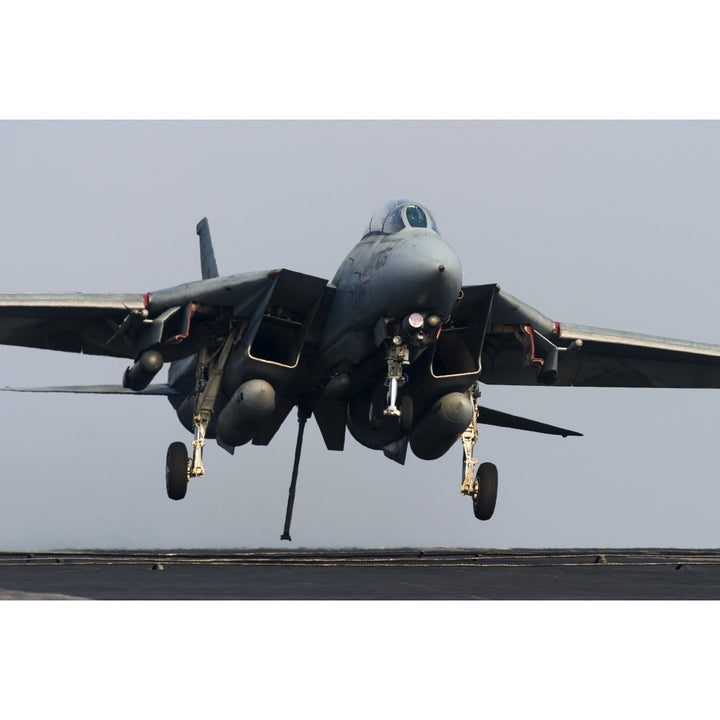 An F-14D Tomcat comes in for an arrested landing on the flight deck of USS Theodore Roosevelt Poster Print Image 2