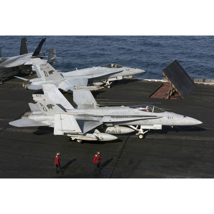 An F/A-18C Hornet during flight operations on USS Dwight D. Eisenhower Poster Print Image 1