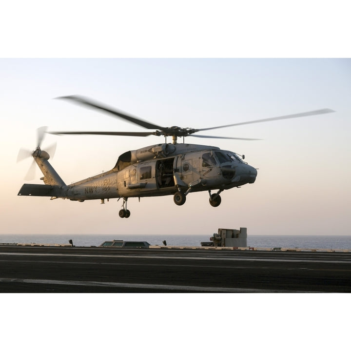 A Sikorsky SH-60F Seahawk lands on the flight deck of USS Dwight D. Eisenhower Poster Print Image 1