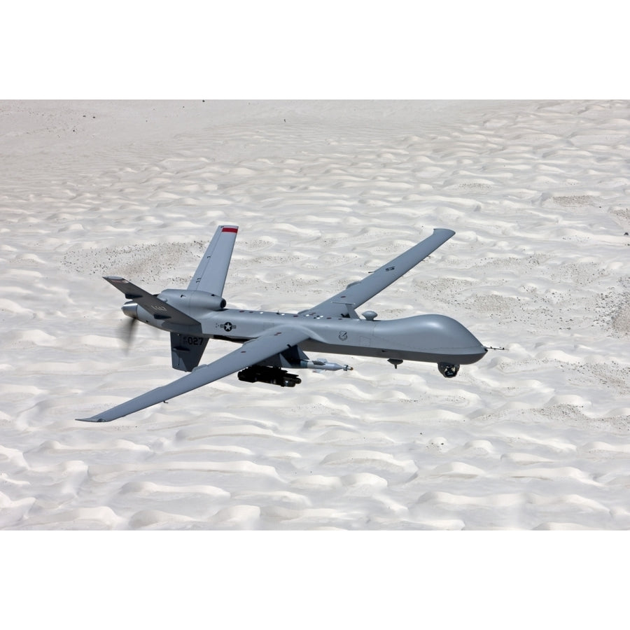 An MQ-9 Reaper flies a training mission over Southern Mexico Poster Print Image 1