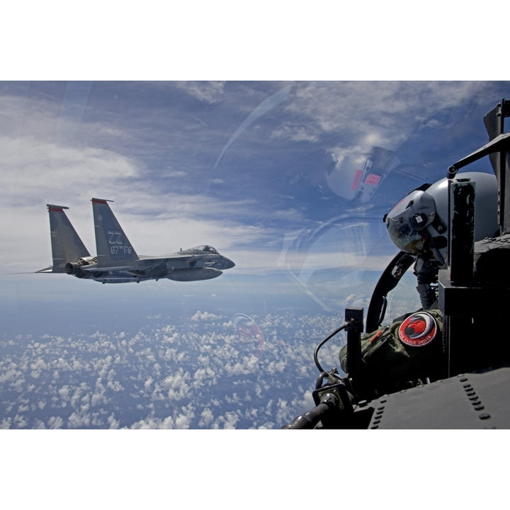 An F-15 Eagle pilot flies in formation with his wingman Poster Print Image 2