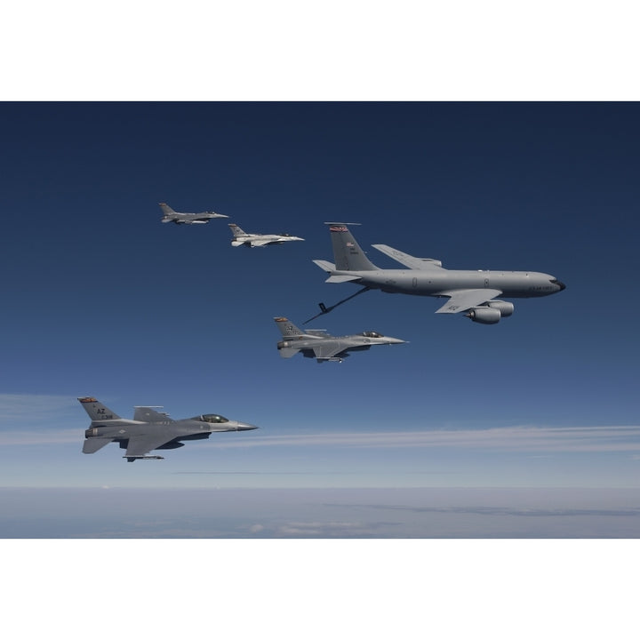 Four F-16s and a KC-135 fly in formation over Arizona Poster Print Image 1