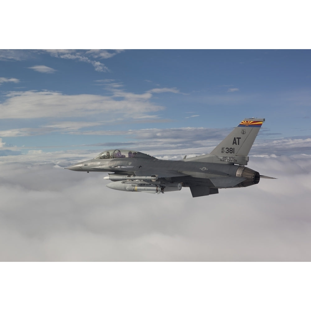 An F-16 Fighting Falcon flies with an AGM-65 Maverick missile Poster Print Image 2