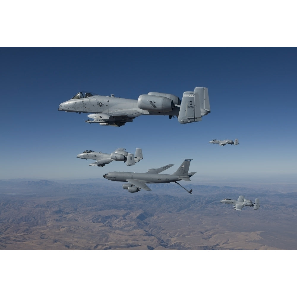 Four A-10C Thunderbolts prepare to refuel from a KC-135 Poster Print Image 1