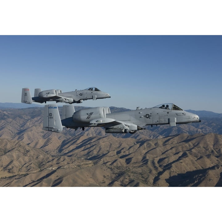 Two A-10 Thunderbolts fly over Central Idaho Poster Print Image 1