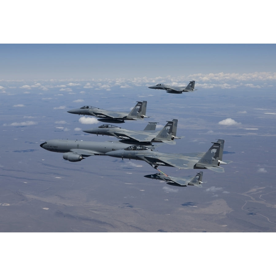 Five F-15 Eagles conduct aerial refueling with a KC-135 Stratotanker Poster Print Image 1