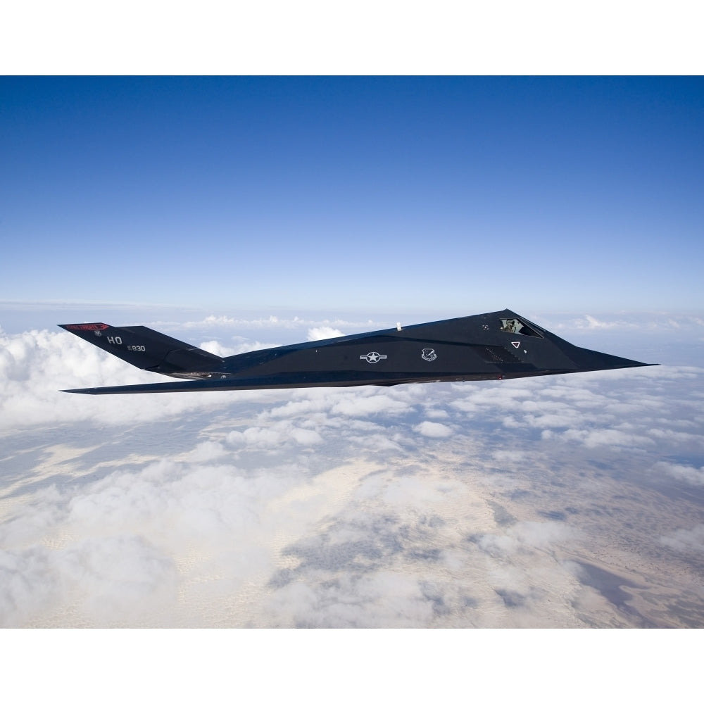 An F-117 Nighthawk stealth fighter in flight over Mexico Poster Print Image 2