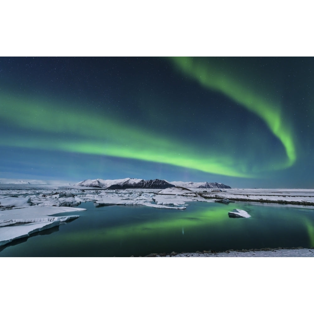 The northern lights dance over the glacier lagoon in Iceland Poster Print Image 2