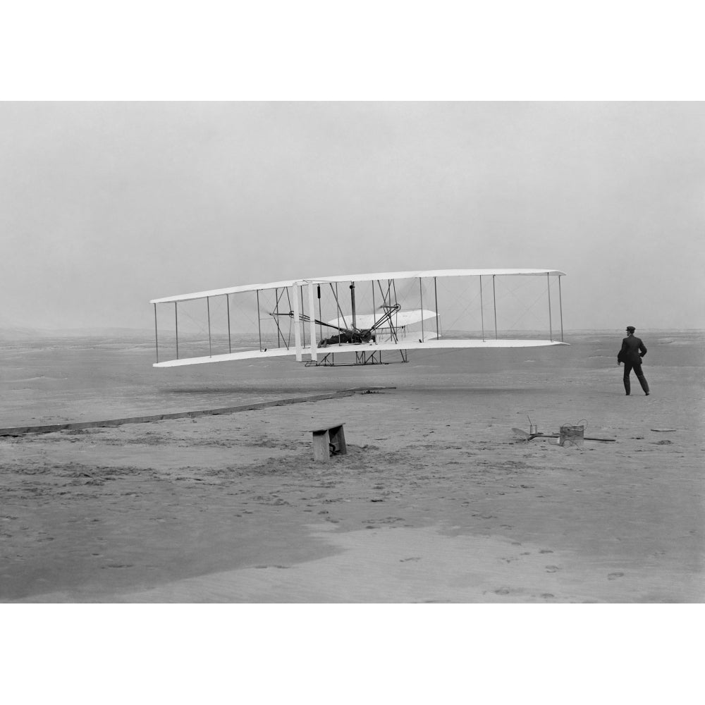 The first flight of the Wright Flyer in 1903 Poster Print Image 2