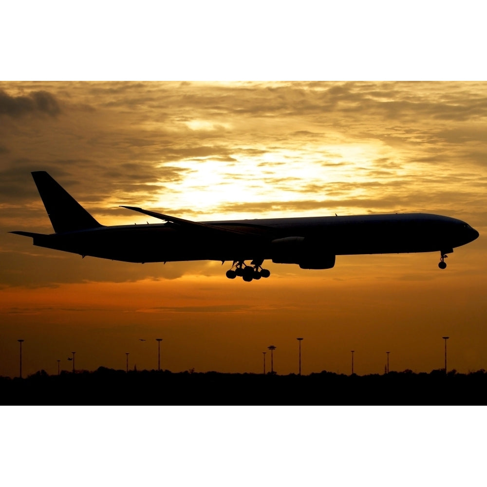 Silhouette of a Pakistan International Airlines Boeing 777 Poster Print Image 1