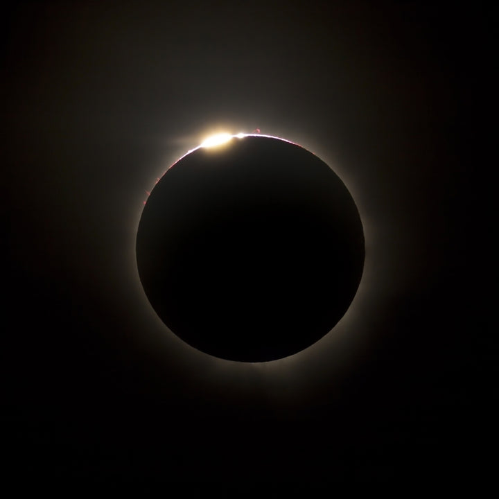 Solar eclipse with prominences and diamond ring effect Poster Print Image 1