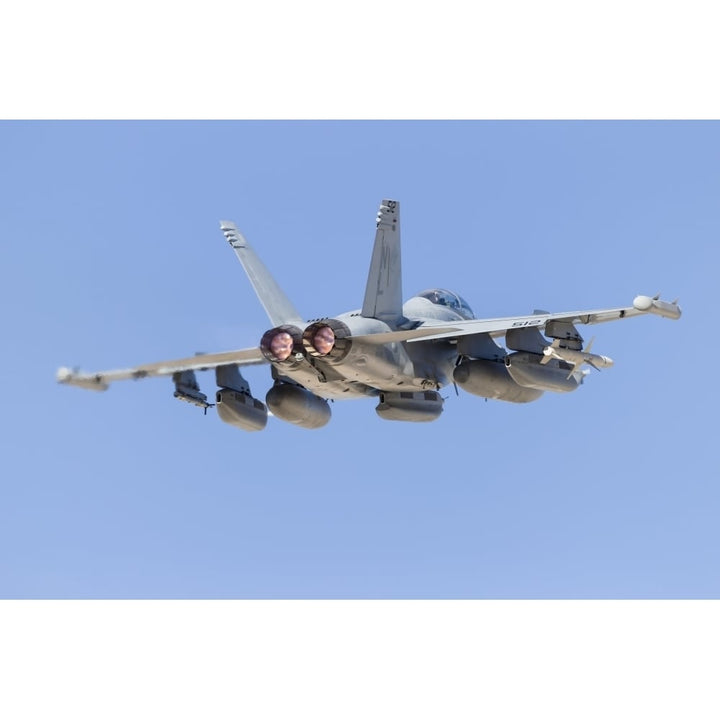 A U.S. Navy E/A-18G Growler taking off from Nellis Air Force Base Nevada. Poster Print by Rob Edgcumbe/Stocktrek Images Image 2