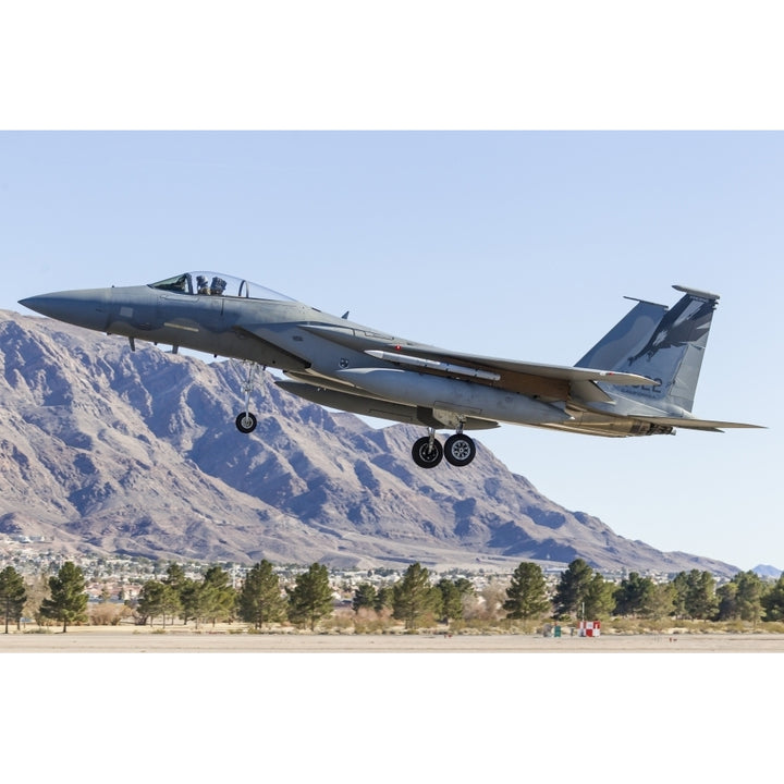 A U.S. Air Force F-15C Eagle on final approach to Nellis Air Force Base Nevada. Poster Print by Rob Edgcumbe/Stocktrek Image 1