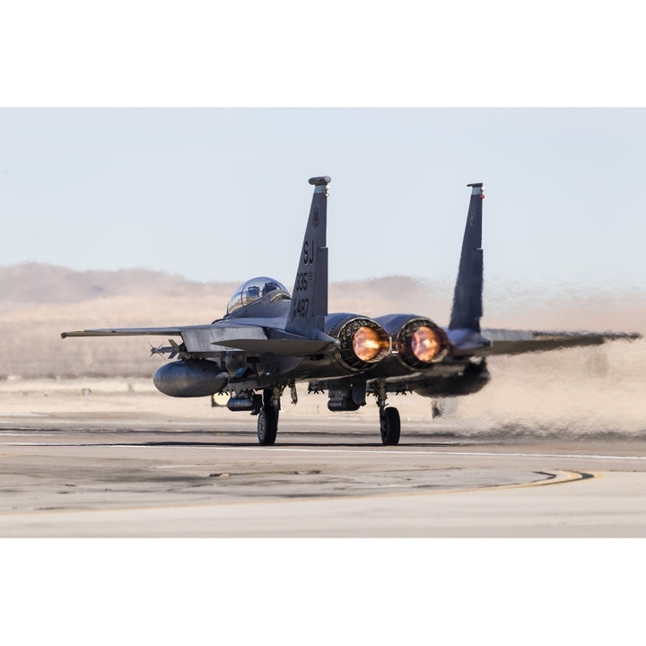 A U.S. Air Force F-15E Strike Eagle takes off in full afterburner. Poster Print by Rob Edgcumbe/Stocktrek Images Image 1