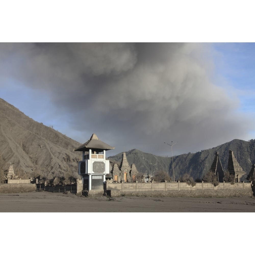 Ash cloud passing over temple at foot of Mount Bromo Volcano Tengger Caldera Java Indonesia Poster Print Image 1