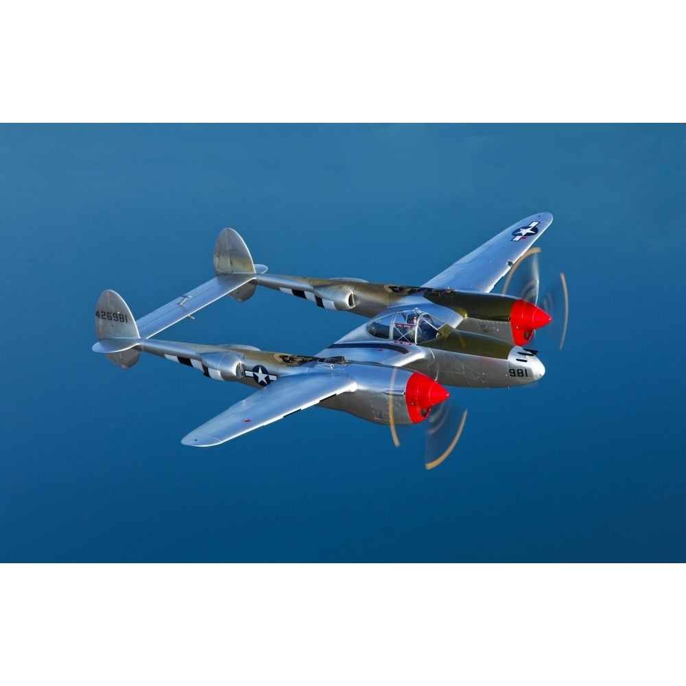 A Lockheed P-38 Lightning fighter aircraft in flight Poster Print Image 1