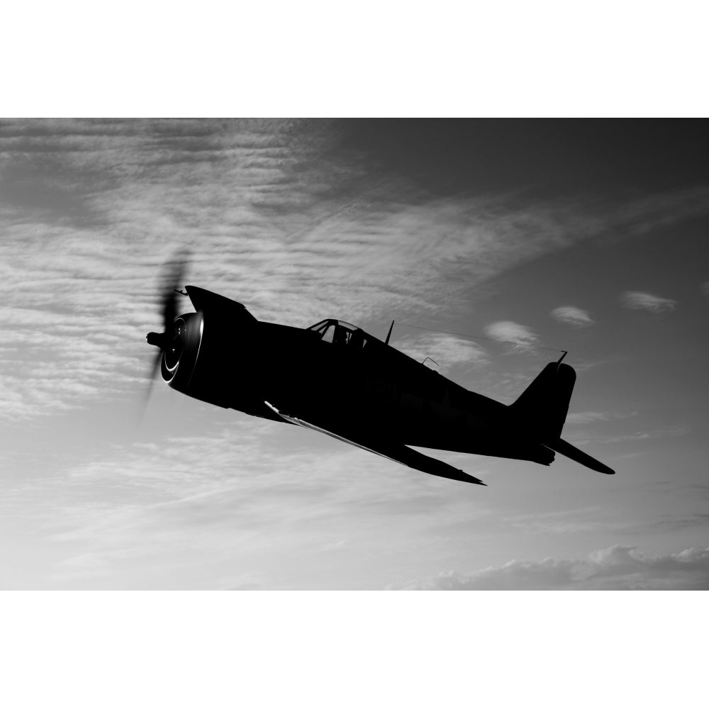 A Grumman F6F Hellcat fighter plane in flight Poster Print Image 1