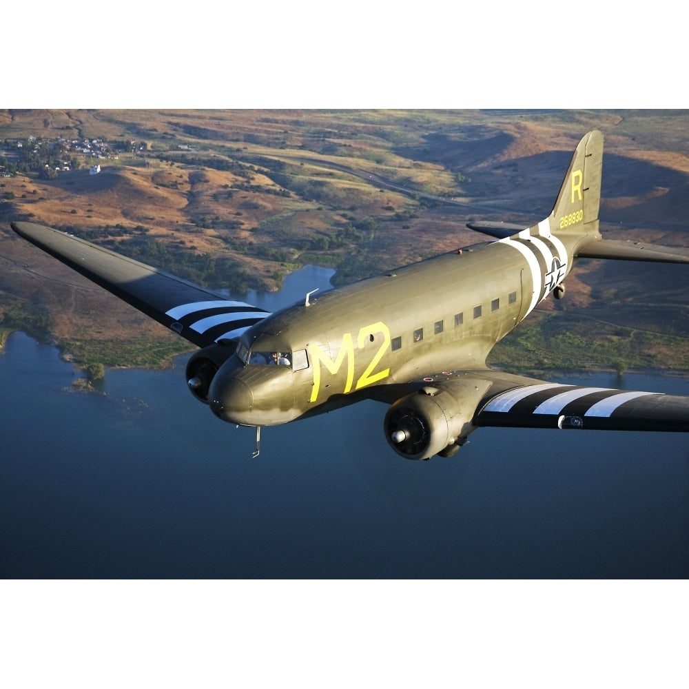 A Douglas C-53 Skytrooper in flight near Chino California Poster Print Image 1