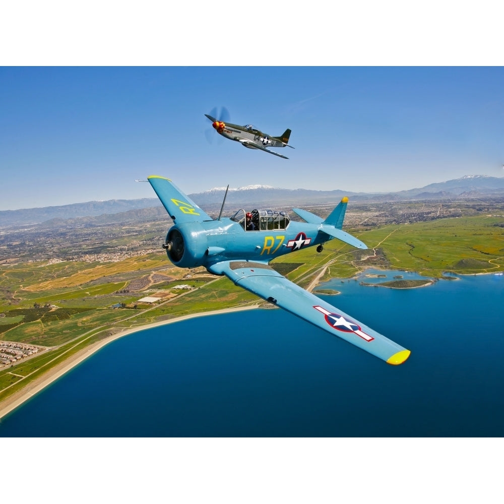 A T-6 Texan and P-51D Mustang in flight over Chino California Poster Print Image 1