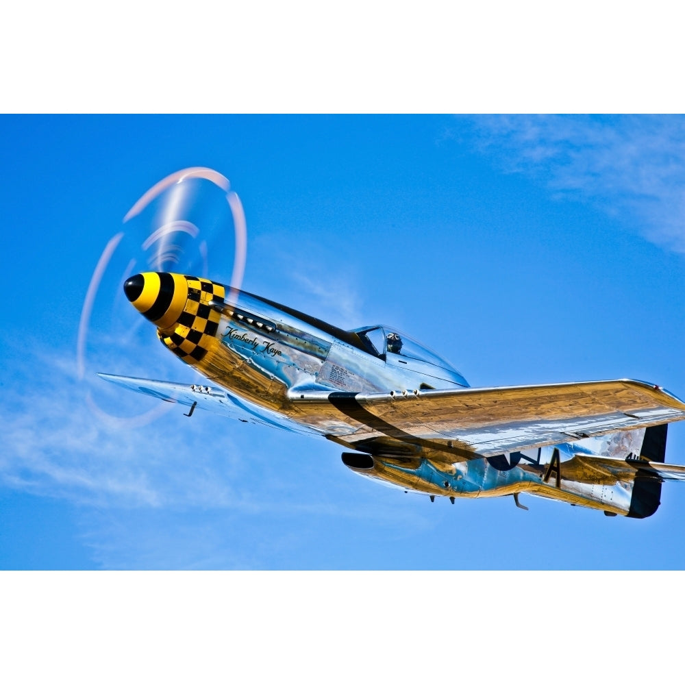 A North American P-51D Mustang in flight near Chino California Poster Print Image 1