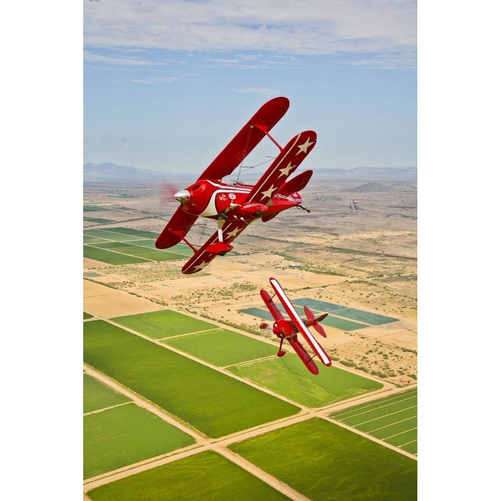 Two Pitts Special S-2A aerobatic biplanes in flight near Chandler Arizona Poster Print Image 1