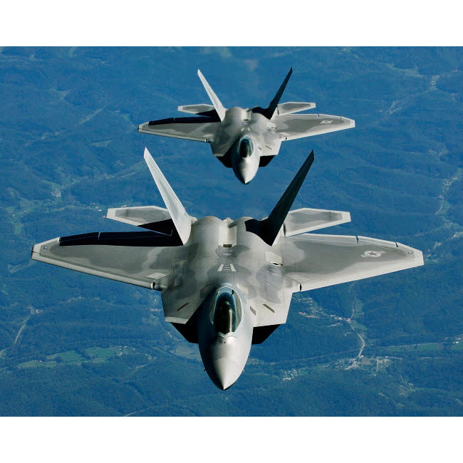 Two F-15s fly in formation behind a KC-10 Extender Poster Print by Stocktrek Images Image 2