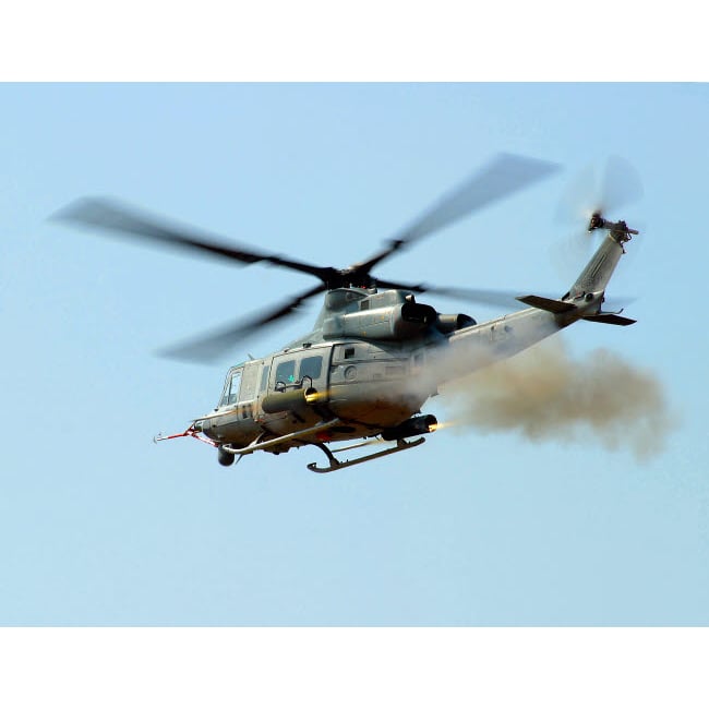 H-1 Upgrades Test Pilot launches a pair of 275 inch rockets from UH-1Y Poster Print by Stocktrek Images Image 2