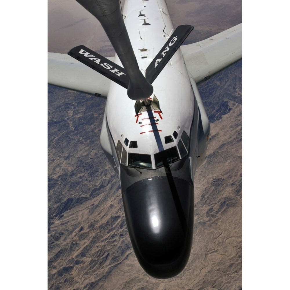 An RC-135 Rivet Joint Reconnaissance aircraft receives fuel from a KC-135 Stratotanker Poster Print Image 1