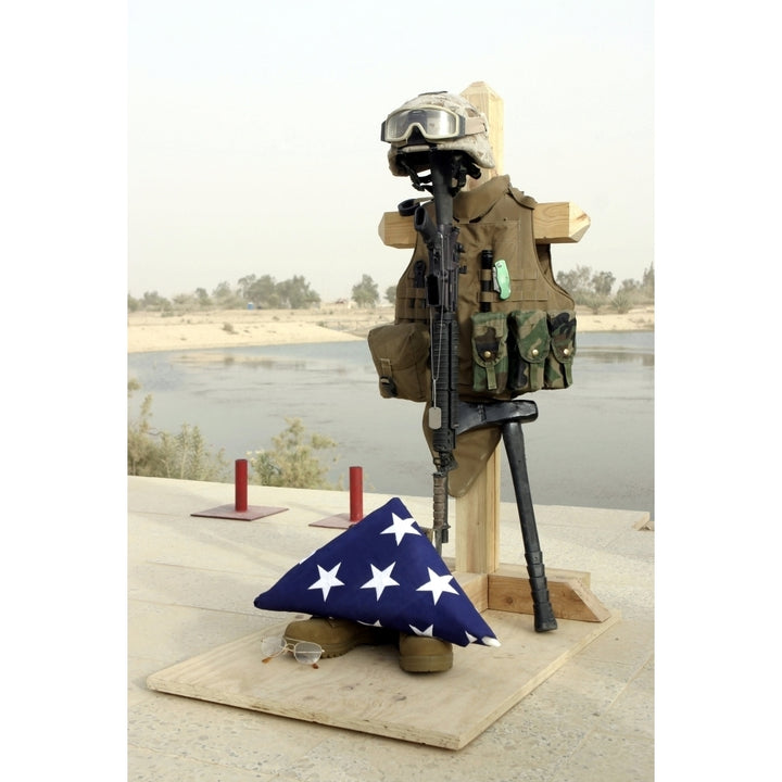 A fallen soldiers gear display Poster Print Image 1