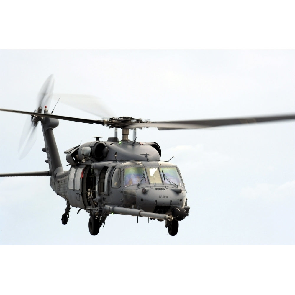 An HH-60 Pave Hawk helicopter conducts search and rescue operations Poster Print Image 1