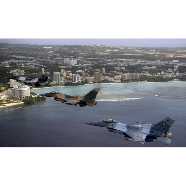 Three F-16 Fighting Falcons fly in formation over Tumon Bay Guam Poster Print Image 2