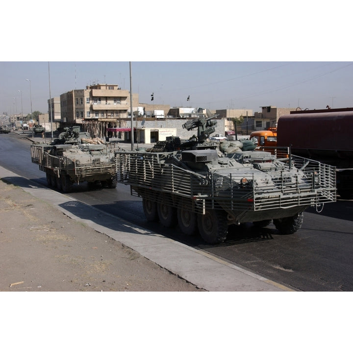 U.S. Army soldiers patrolling in Stryker armored wheeled vehicles as part of Operation Block Party Print Image 2