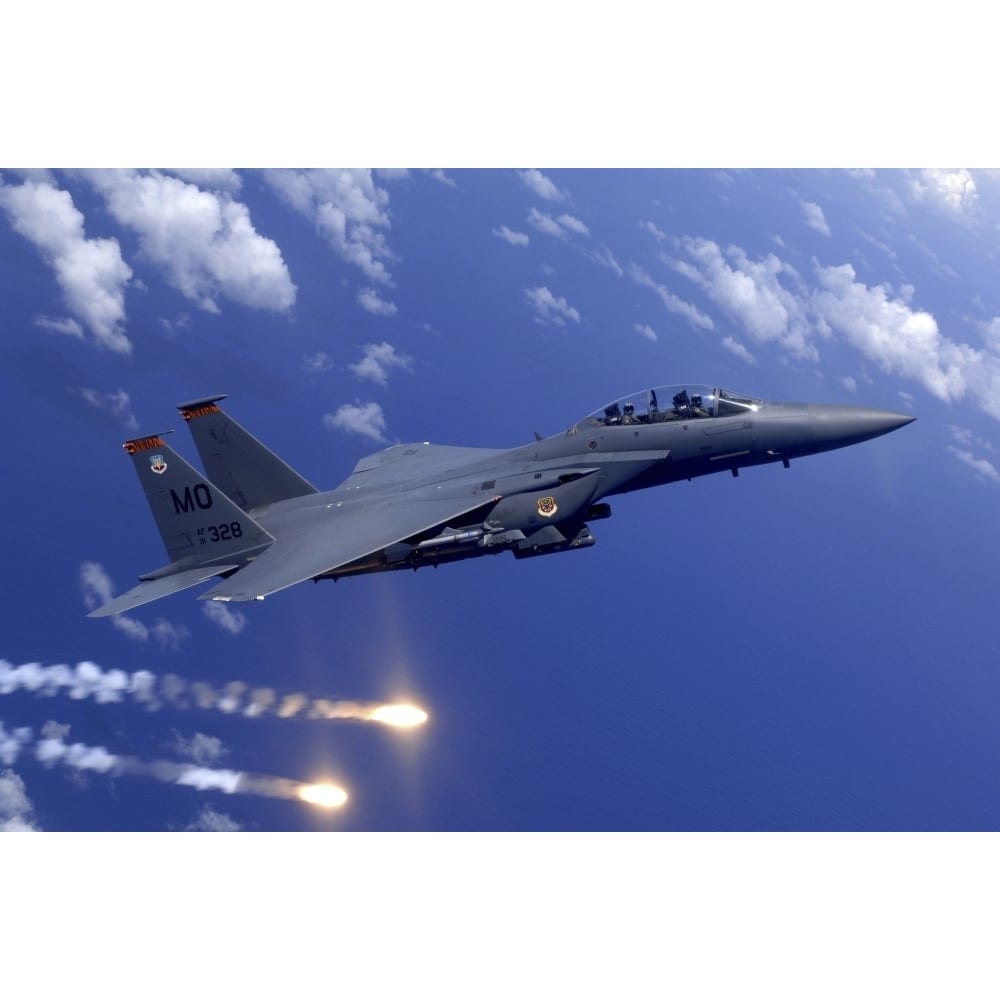 An Air Force F-15E Strike Eagle fires flares during an aerial training dog fight off the coast of Guam Print Image 1