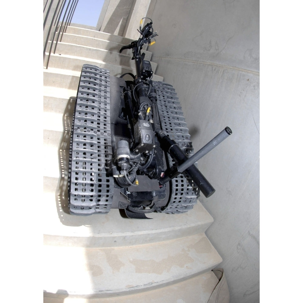 A Talon 3B robot unit climbing a flight of stairs during a training mission in Bahrain Poster Print Image 1