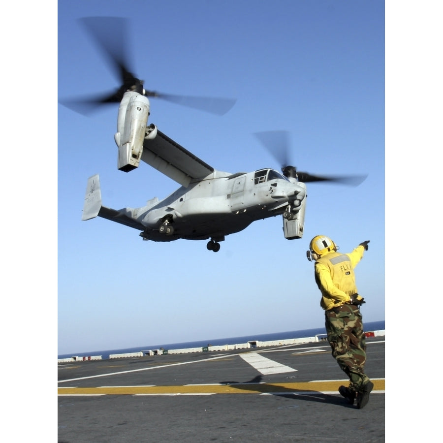 An MV-22 Osprey launches from the USS Nassau Poster Print Image 1