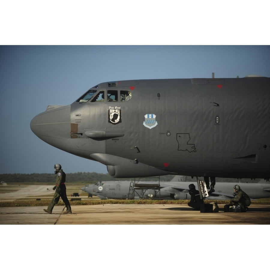 A U.S. Air Force aircrew prepares a B-52 Stratofortress aircraft for a mission Poster Print Image 1