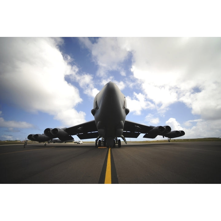 A U.S. Air Force maintenance crew performs post flight checks on a B-52 Stratofortress Poster Print Image 2